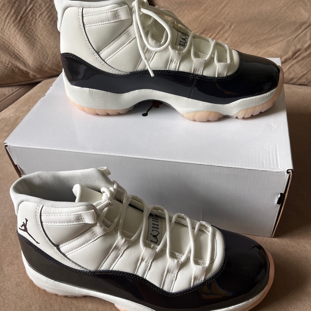 Air Jordan 11 Retro White and Black Sneakers
